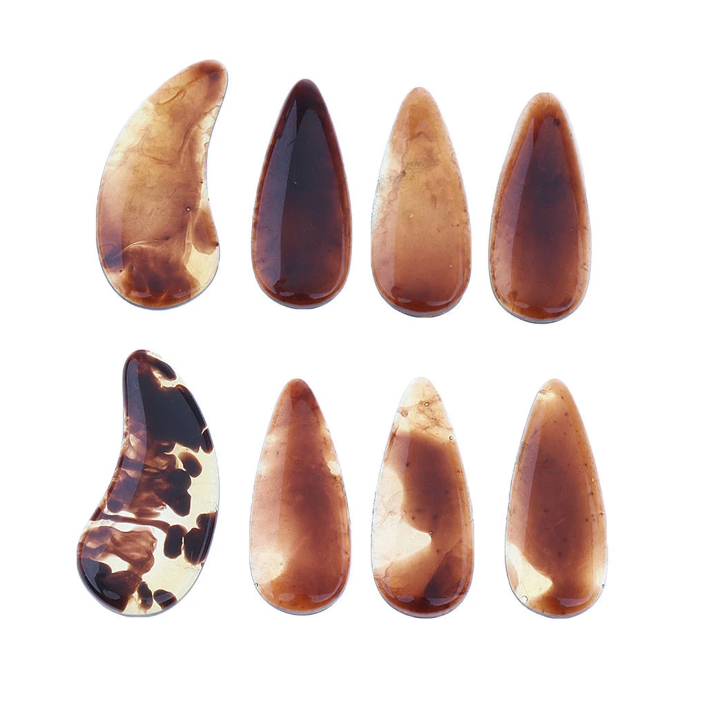 Plastic guzheng nails. Image sourced from ebay listing by alpinetopline.
