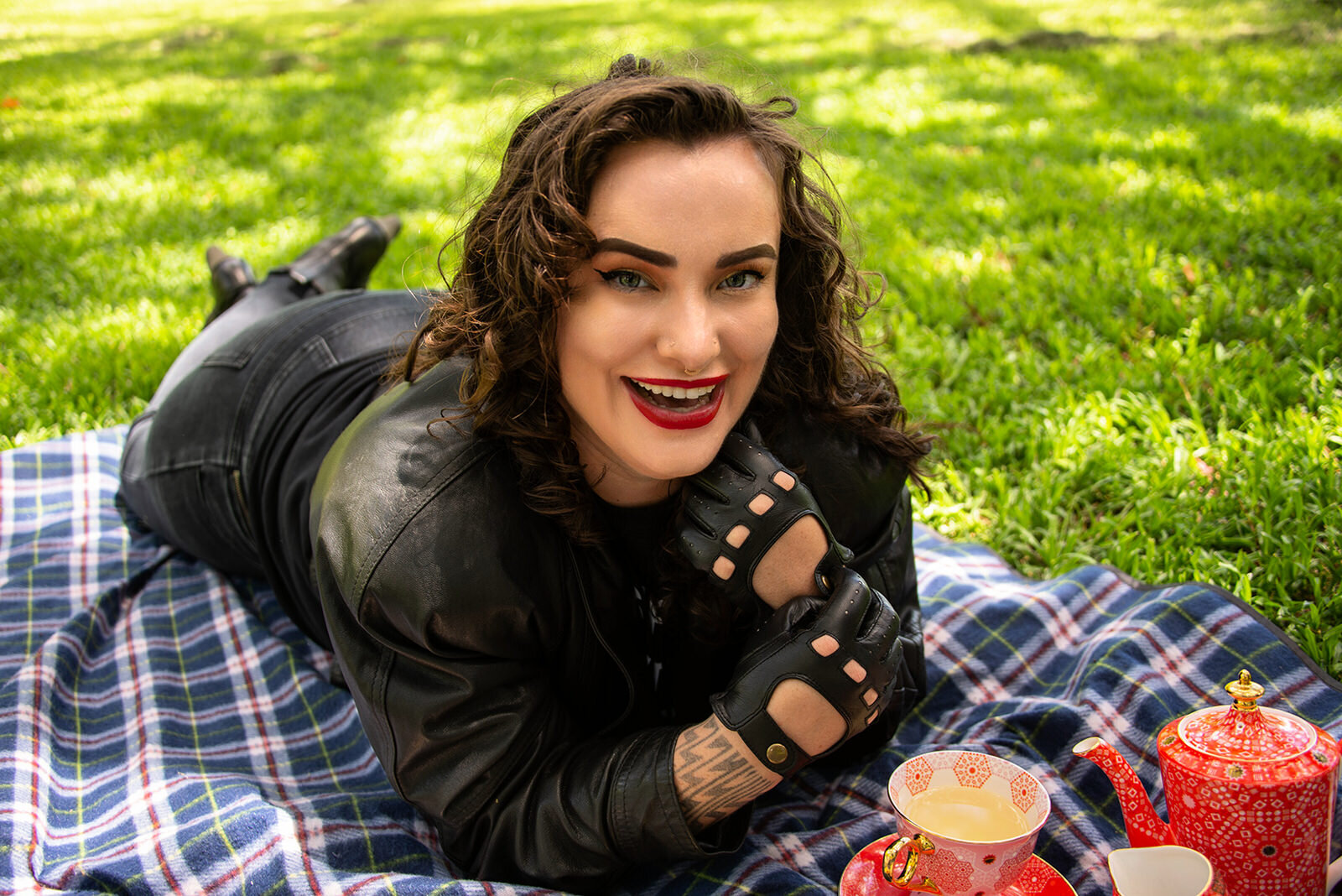 miss tallula leather gloves picnic smiling.jpg