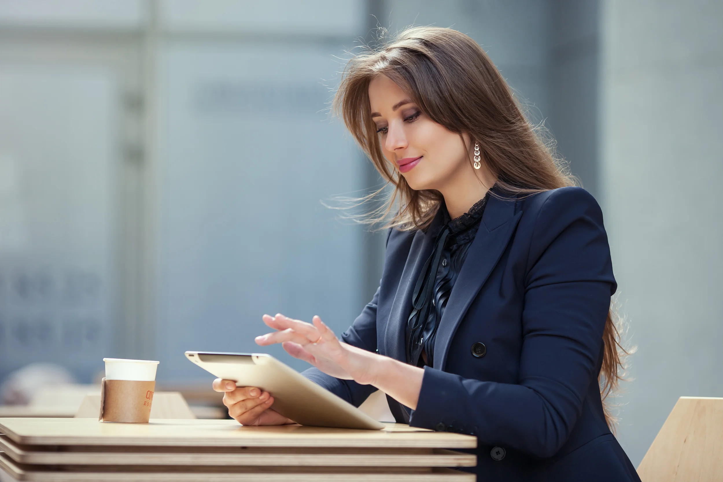 Woman Outside with Computer.jpg