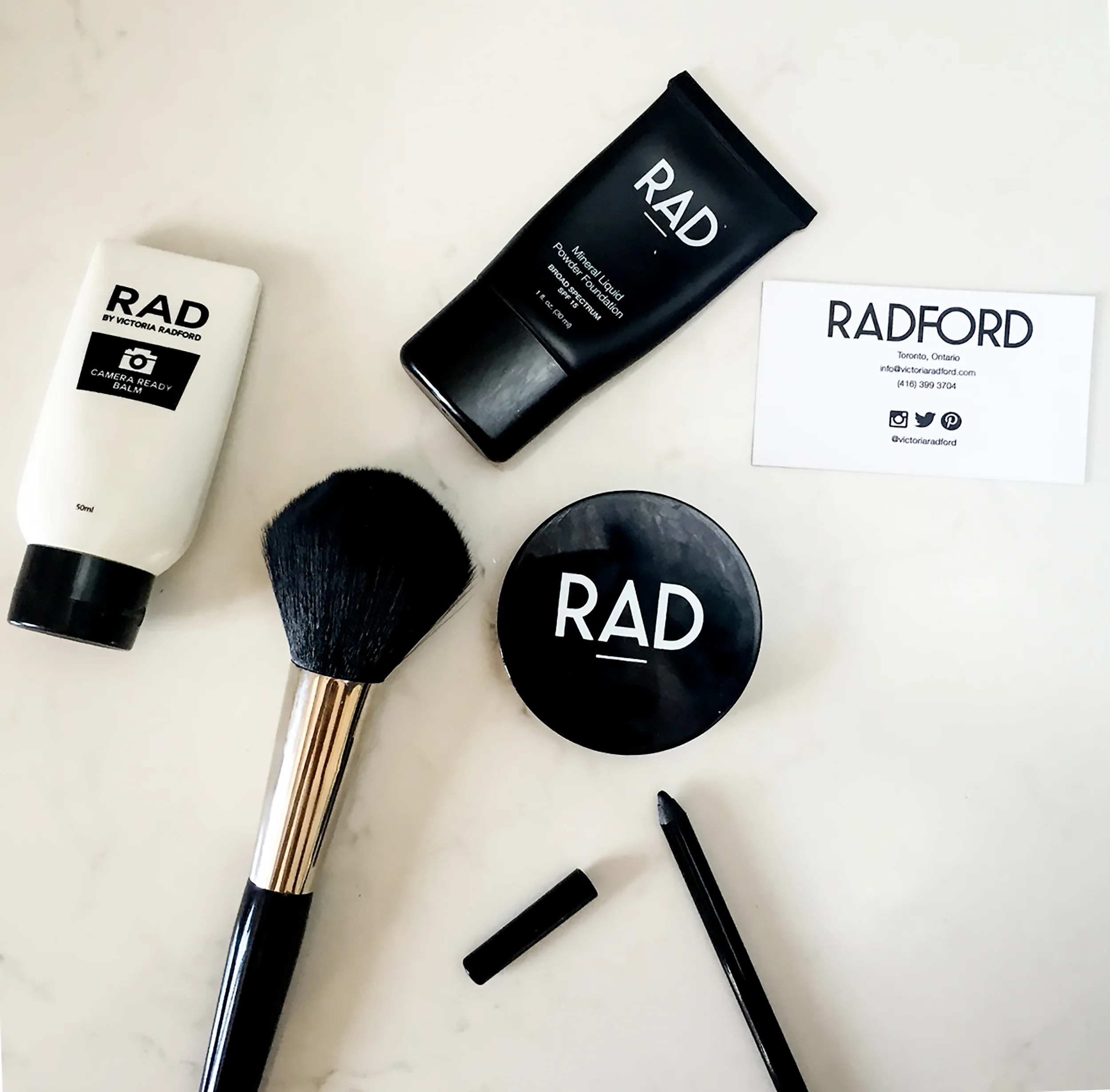 Here's what I got: Vanilla Mineral Liquid Powder Foundation SPF 15, Camera Ready Balm, Soft Focus Powder, the big and oh so soft Powder Brush and a Noir Gel Eye Liner.