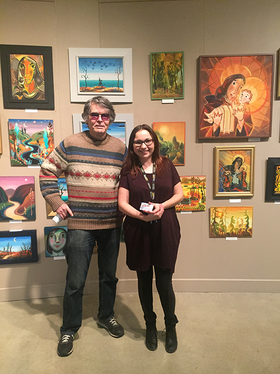 Here I am happily standing with the artist himself.