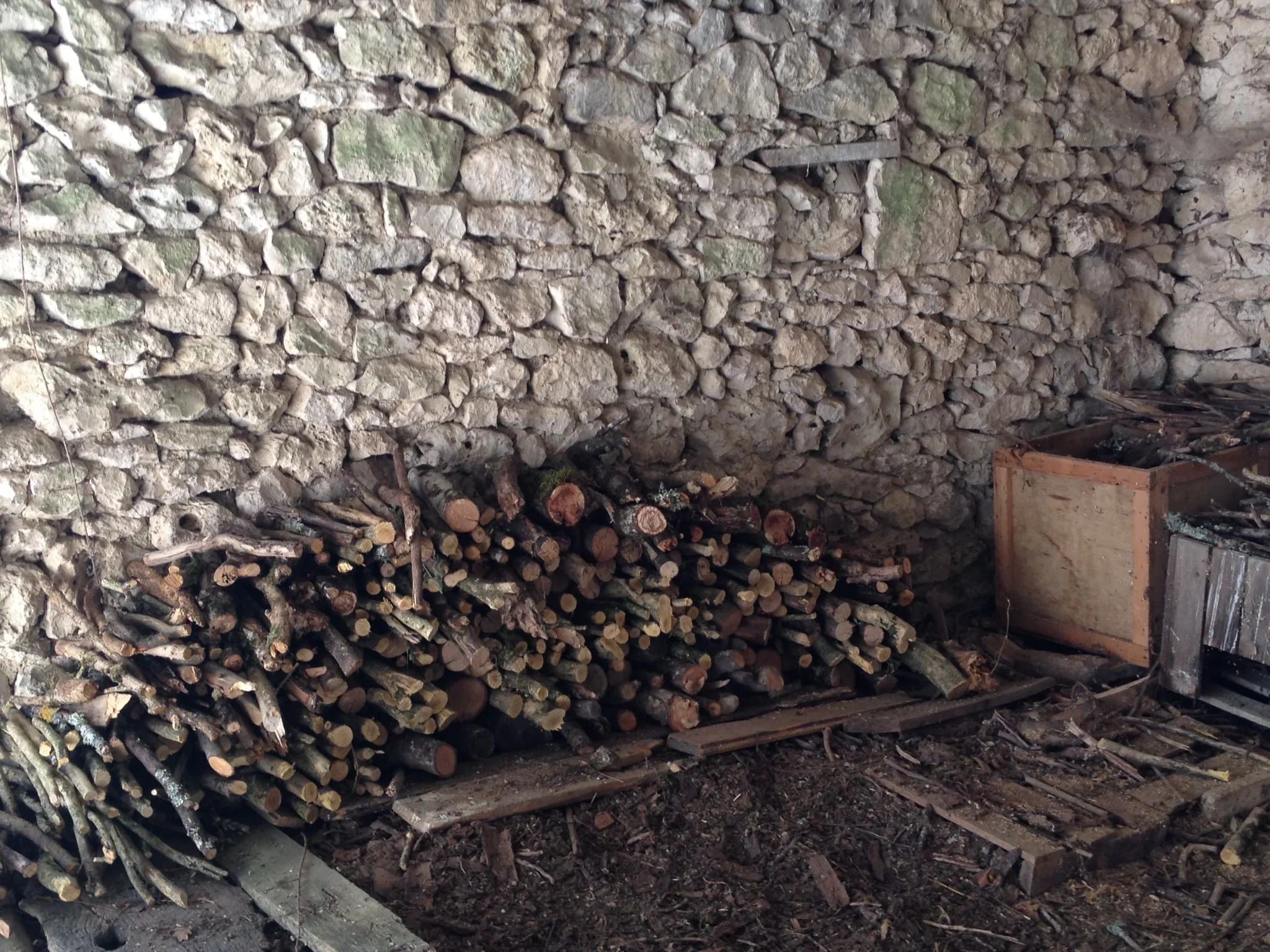 Stacked wood in the wood barn.