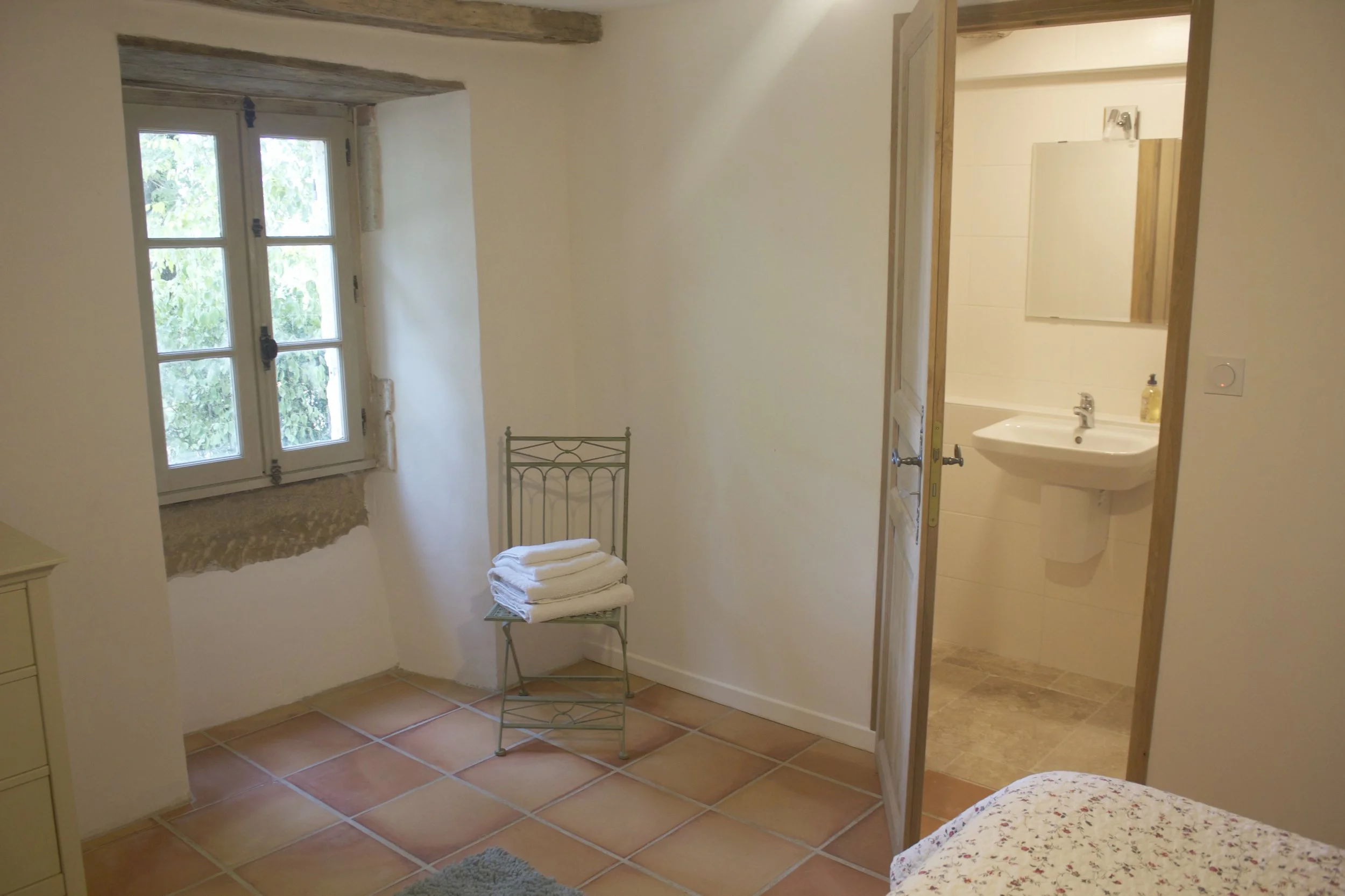 9. Beauville bedroom with a view to into the shower room.