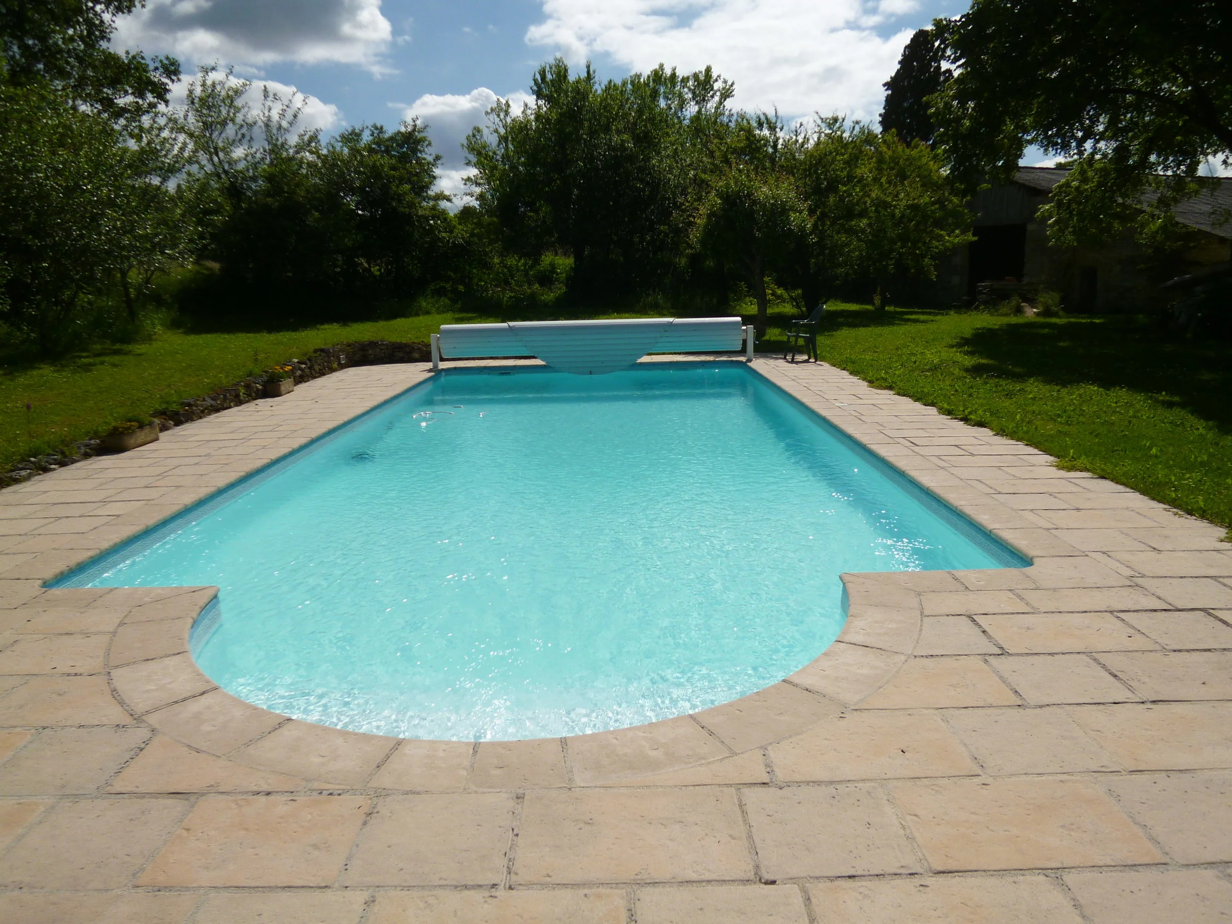 The pool, the security cover open.