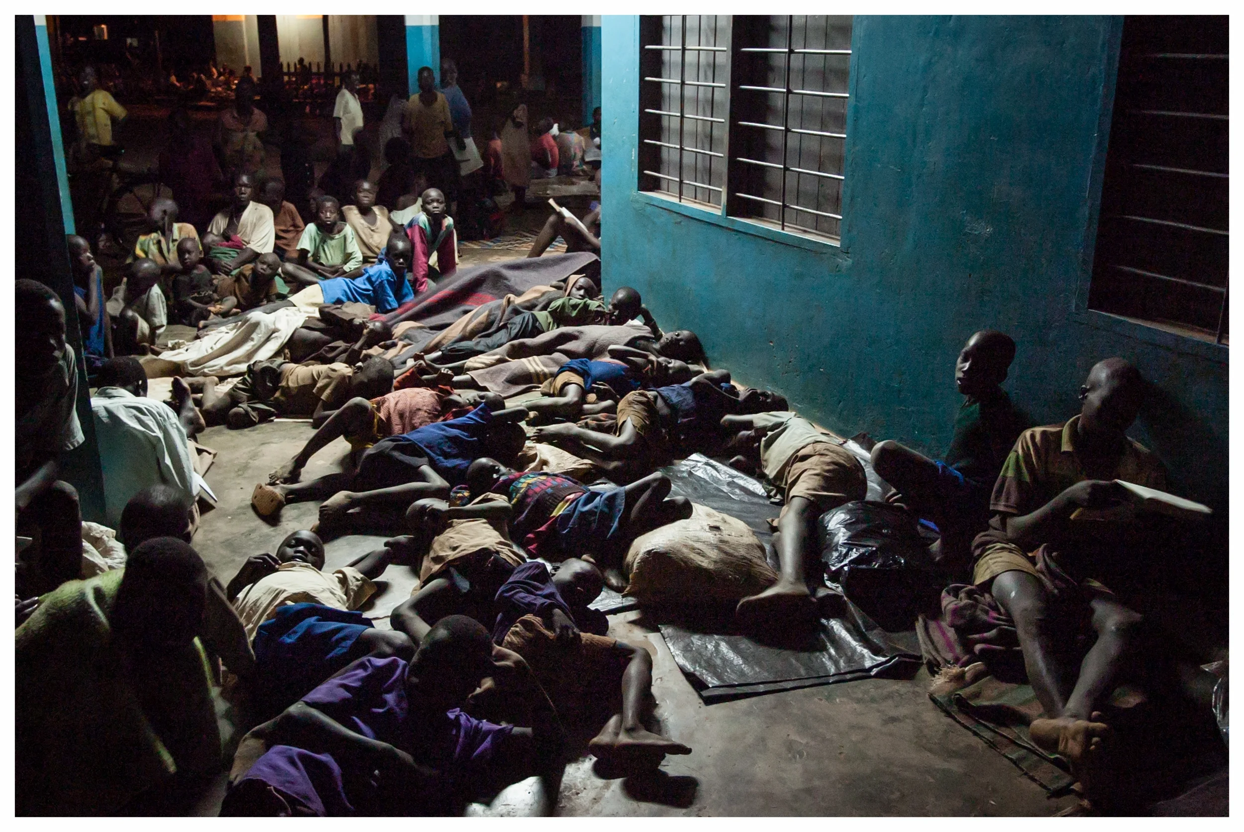 Children sleep rough wherever they can find shelter. Gulu, Northern Uganda. Photo © Marcus Perkins