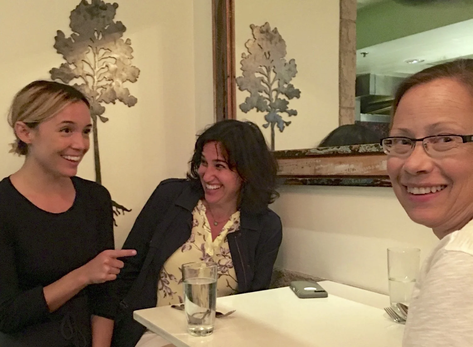 Our server Jamie entertaining Jeanne while I'm distracting Jackie with my camera...