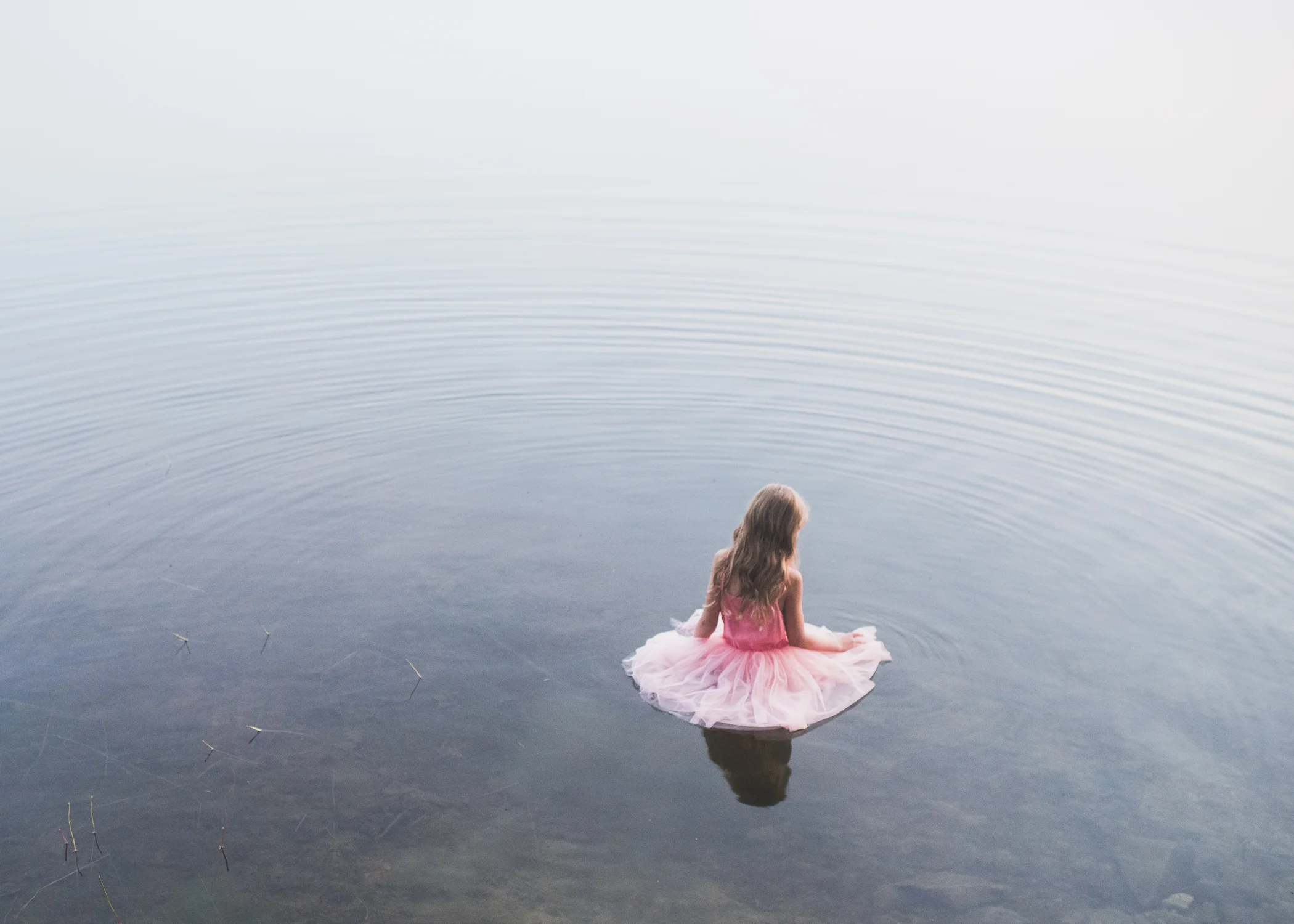 girl in ballet dress standing in lake - maine fine art children's portraits