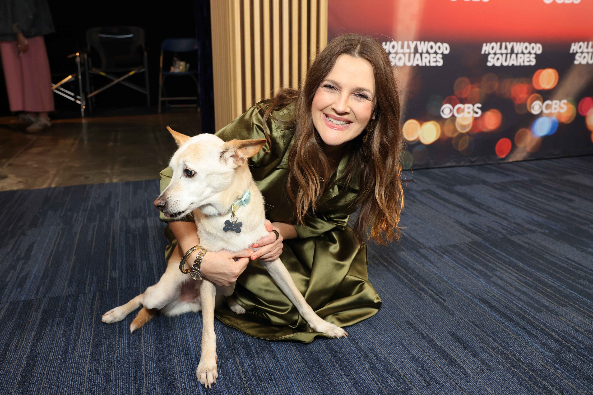  Drew Barrymore and her dog Doug on the set of Hollywood Squares - June 2025 