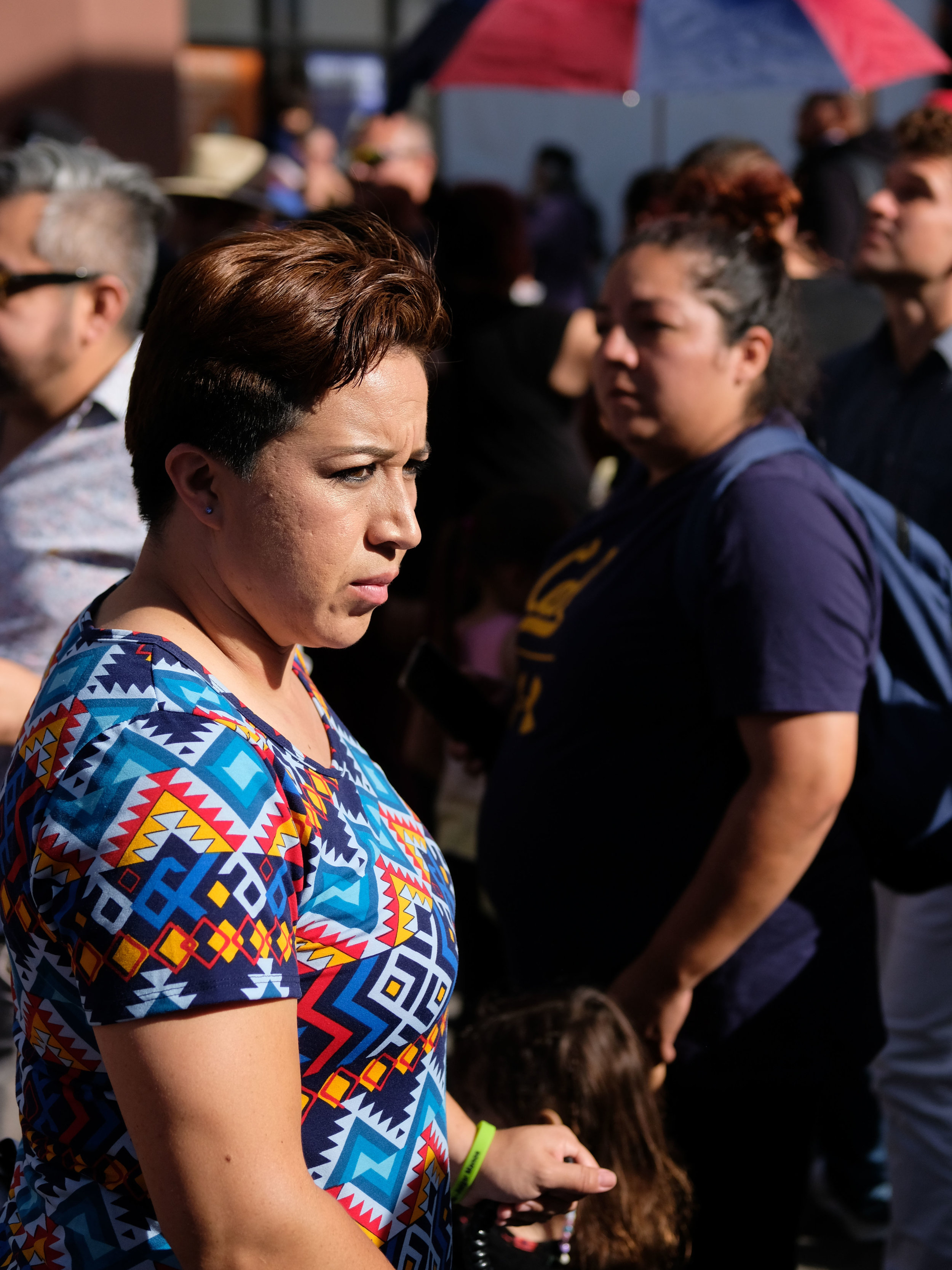  Festival-goers on International Boulevard.  Oakland, CA. 