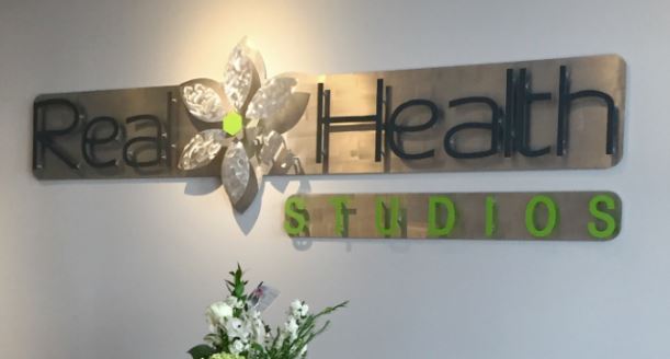 Real Health Studios - Custom Metal Sign.JPG