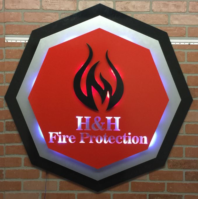 H&H Fire Protection - Custom Metal Sign.JPG