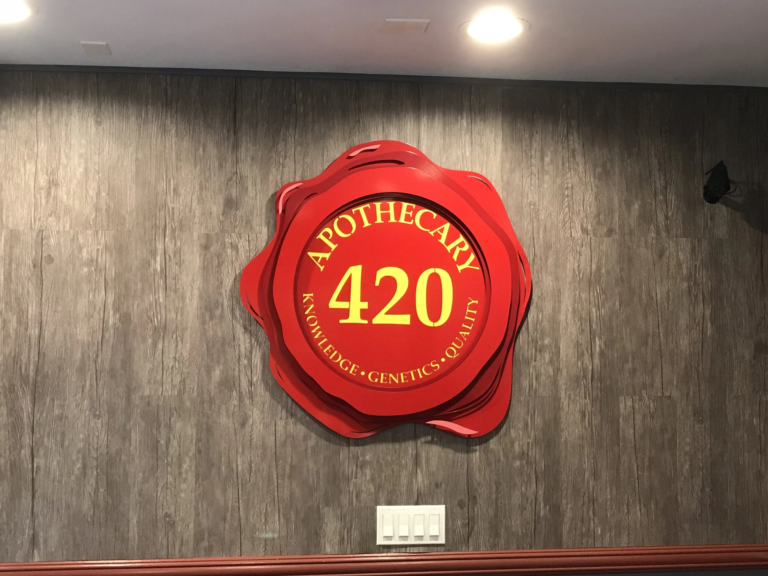Custom Metal Sign-Apothecary 420-front-installed.jpg