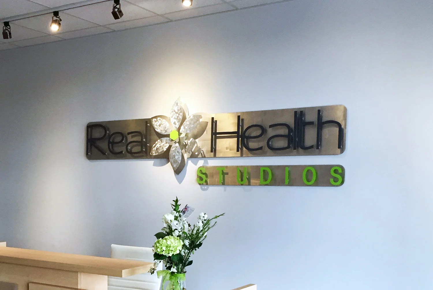 Entryway Sign Real Health Studios