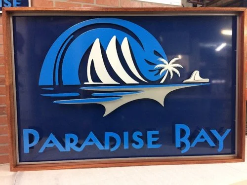 Then we completed fabrication and the client asked us to add a mahogany frame to the sign as well.