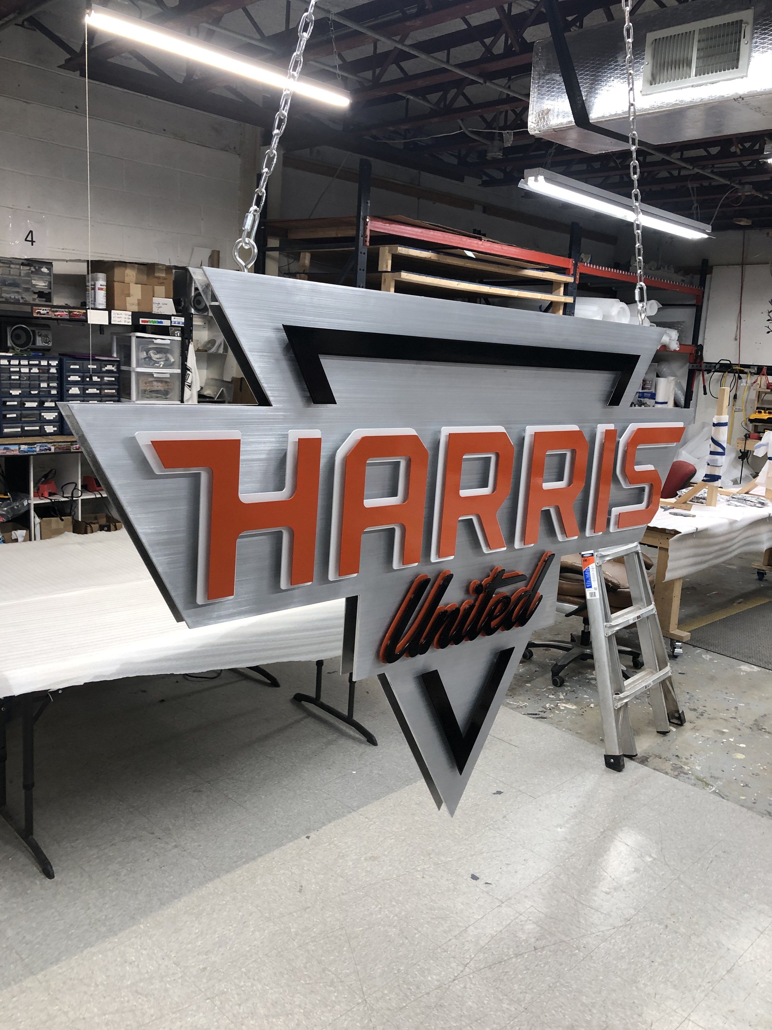 Harris United Multi Layer brushed aluminum blade sign (1).JPG