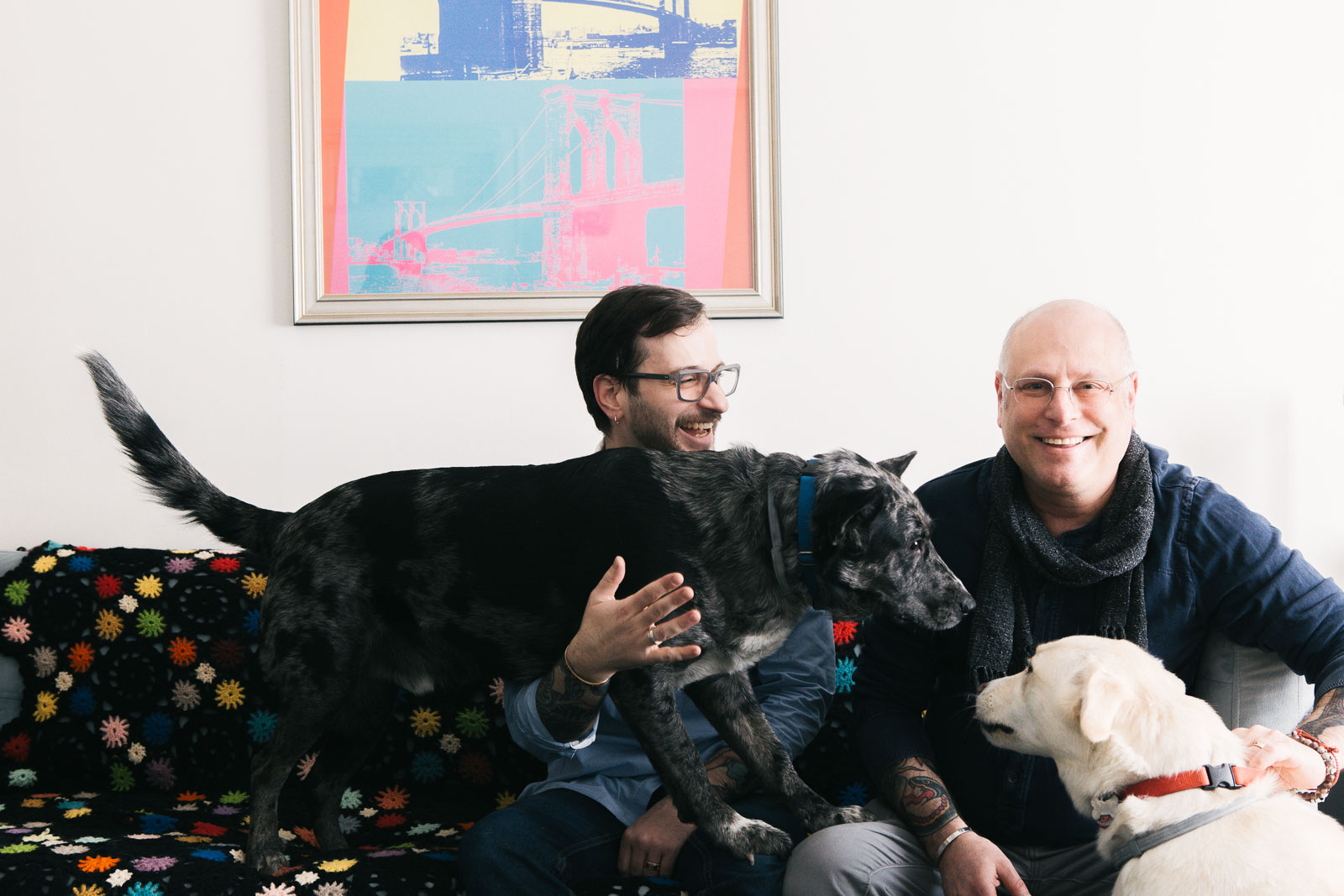 Joe and Gary with their rescue pups Carter and Allie 
