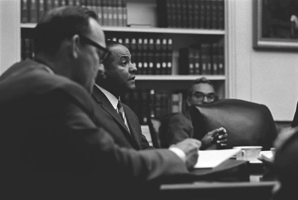 Carl T. Rowan with Henry Kissinger, 1965