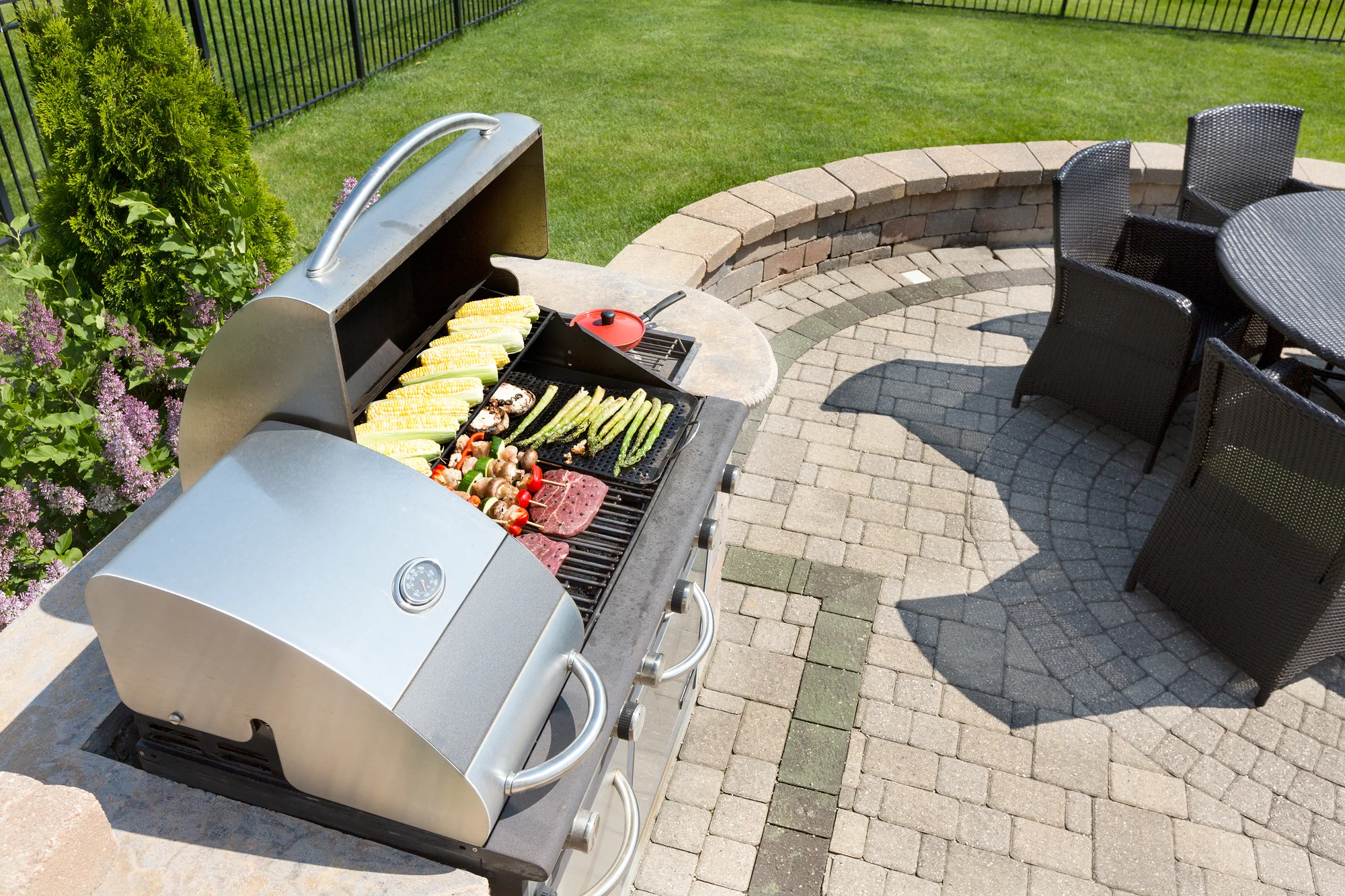 bigstock-Grilling-Food-On-An-Outdoor-Ga-91566653.jpg