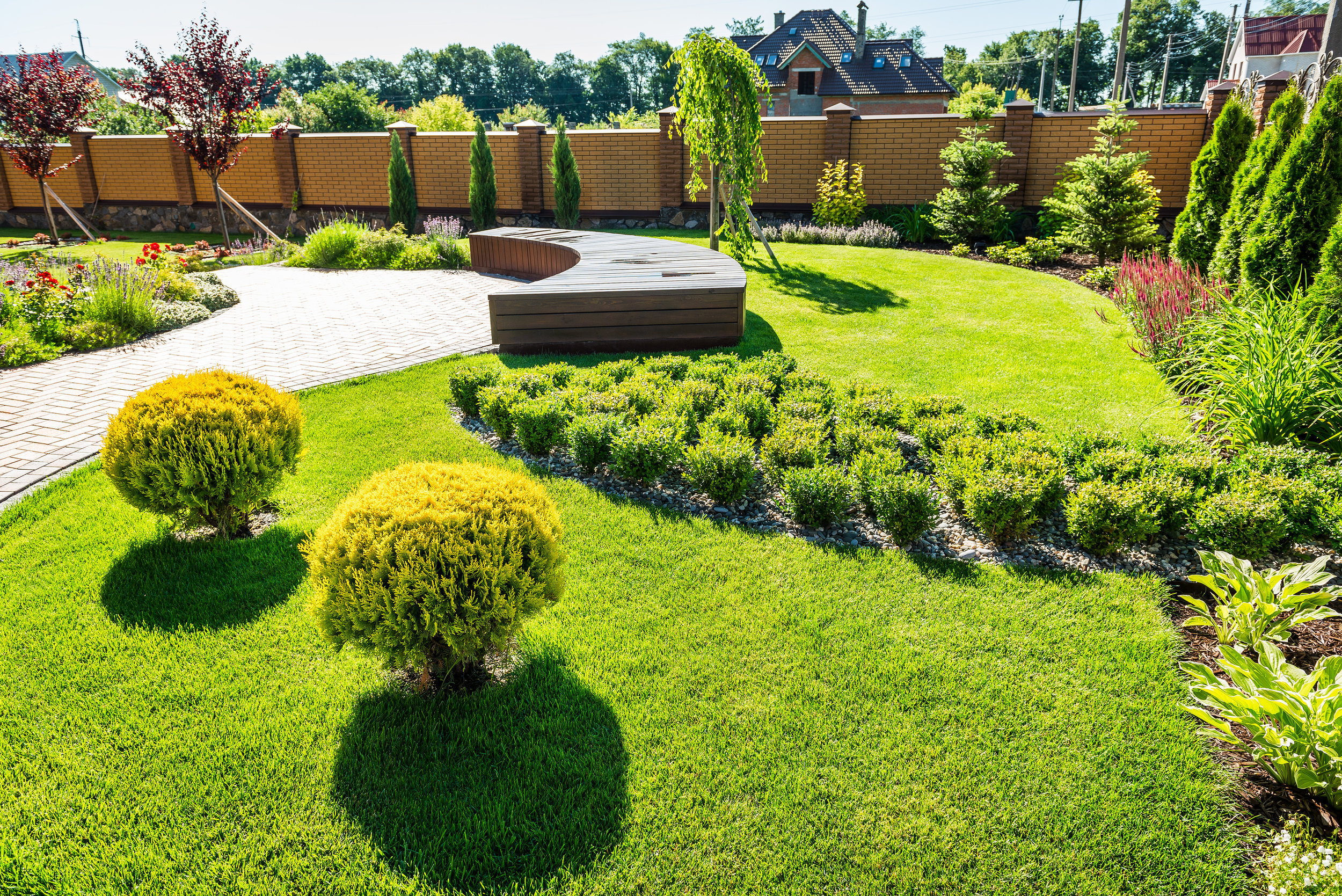 bigstock-Beautiful-Landscaping-With-Bea-185709037.jpg