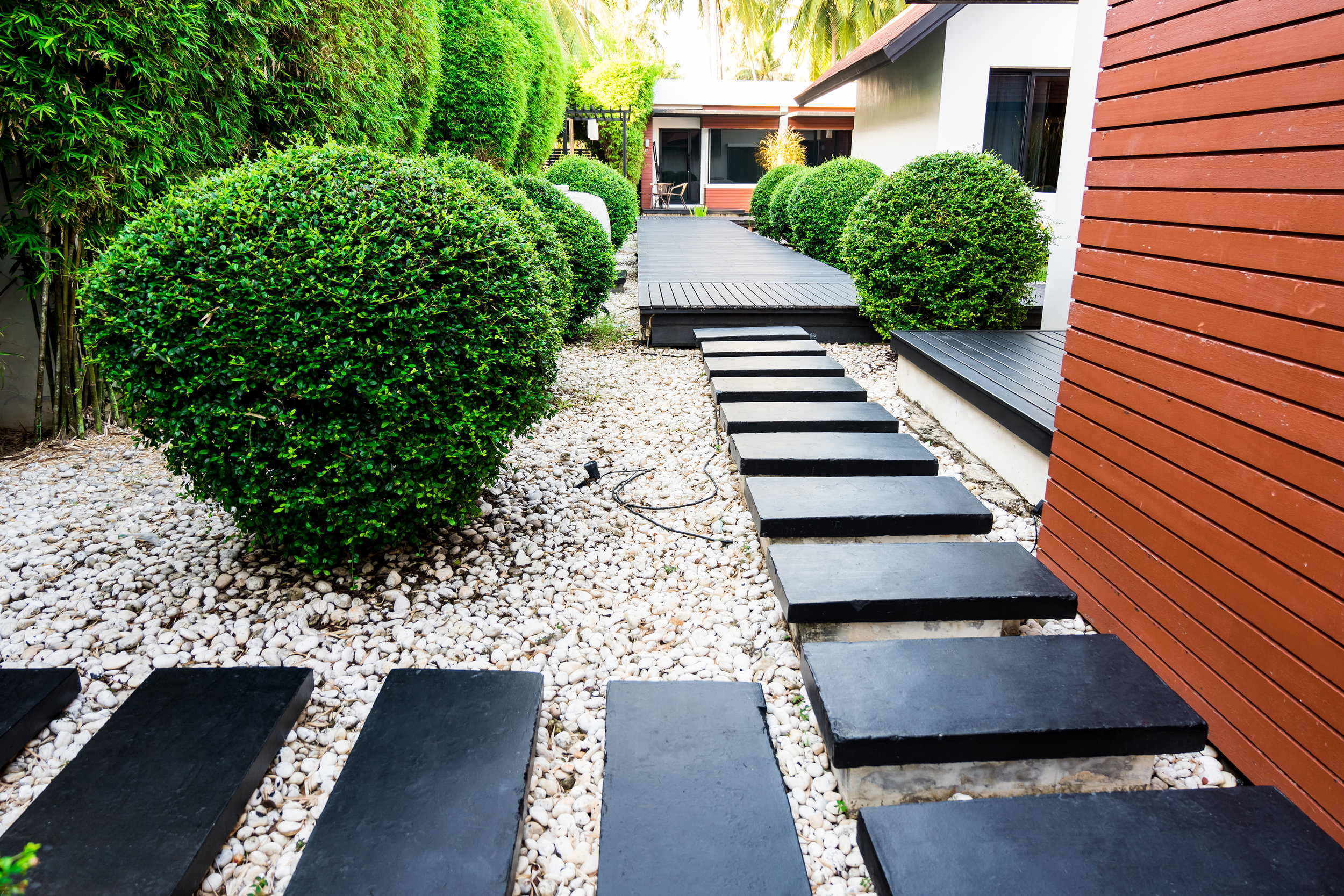 bigstock-Garden-Path-On-White-Pebbles-A-200418136.jpg