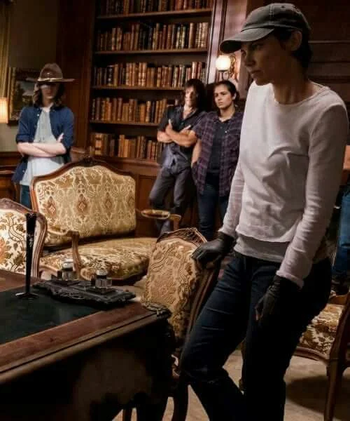 Maggie stares downs at Gregory intently