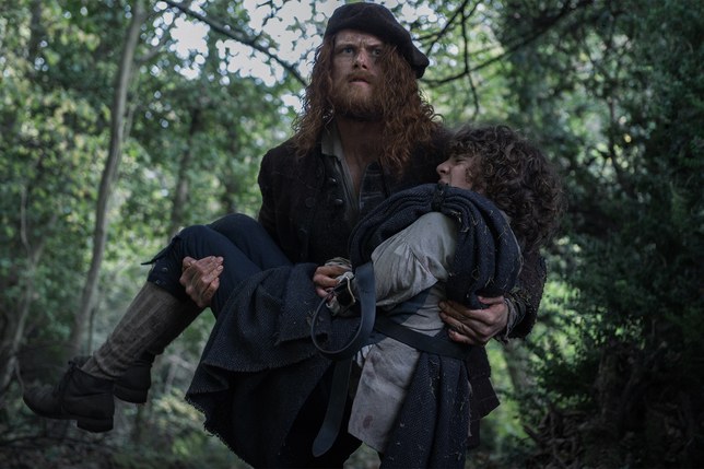 Jamie carry Fergus.jpeg
