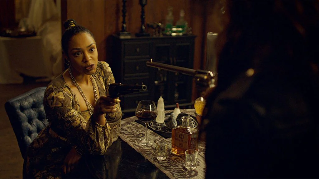 Kate points gun at Wynonna.jpg