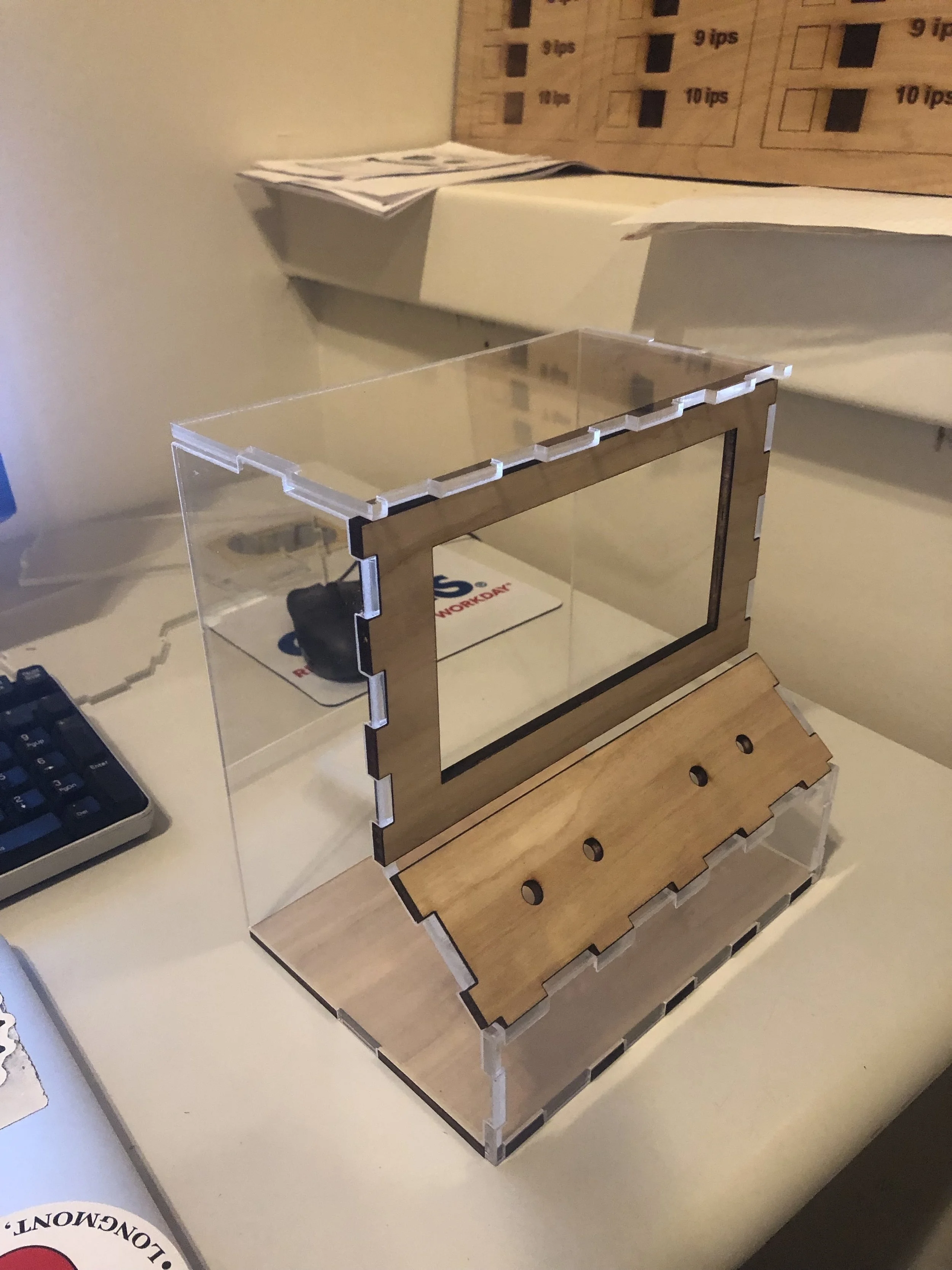 The natural quality of the wood contrasts the crisp acrylic. I leaned towards clean acrylic so let the users see the guts of the machine.