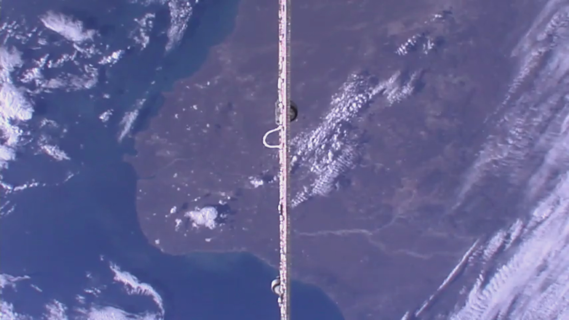 Down camera showing a SpaceX Dragon solar panel