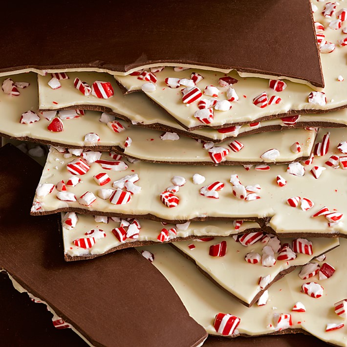 Williams-Sonoma has LOTS of great treats this time of year, but the one that tops my list is their Peppermint Bark . The box is so pretty that you don't even have to wrap it... just get some festive ribbon or tulle to wrap around the box & make a big bow! Easy as 1-2-3! 