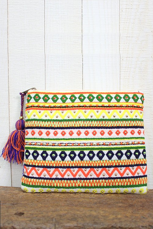 Aztec Beaded Clutch is the vibe for summer nights with a bright tee , wide leg denim jeans , and some arm candy copper bracelets! .