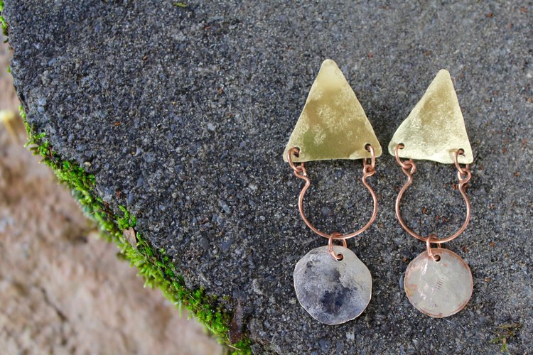 Mixed metal earring ...offered in clip and pierced.