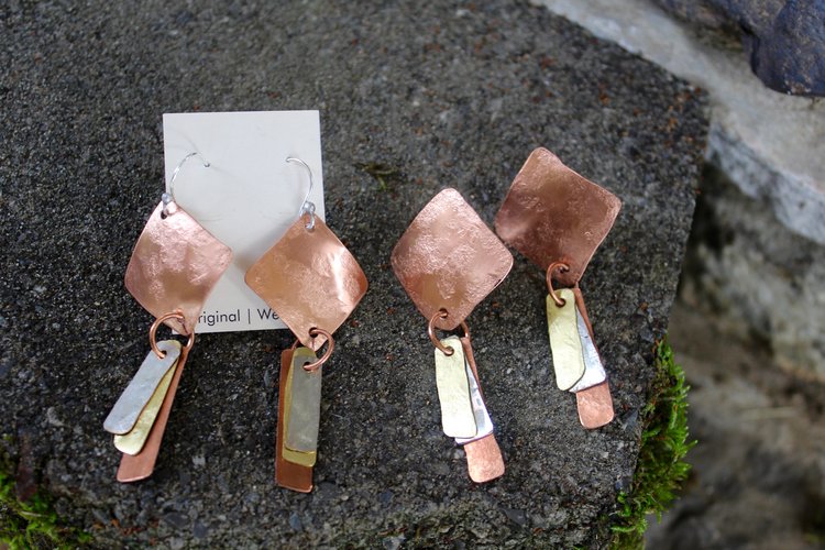 Pierced or clip mixed metal earrings.