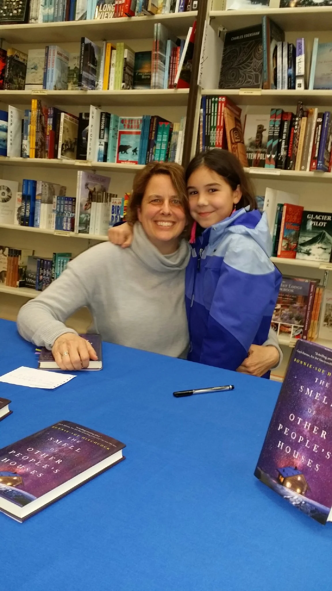 With Sophie Rabung at Hearthside Books in Juneau Alaska. (Photo Credit: Sam Rabung) Fun Fact: When Sophie's mother was a teenager I helped her sneak baby chickens onto an AK Airlines flight in her coat pockets. Actually, the gate agents helped too. This was before the days of TSA, for those who don't remember those days. 