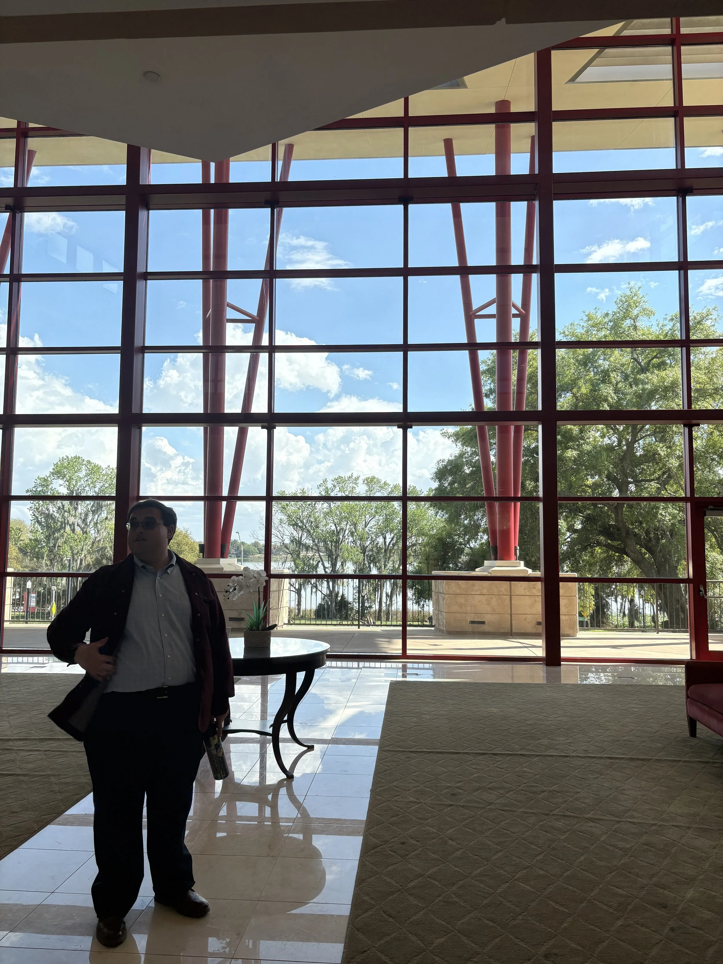 Jack in front of red beam mimicking background oak trees.jpeg