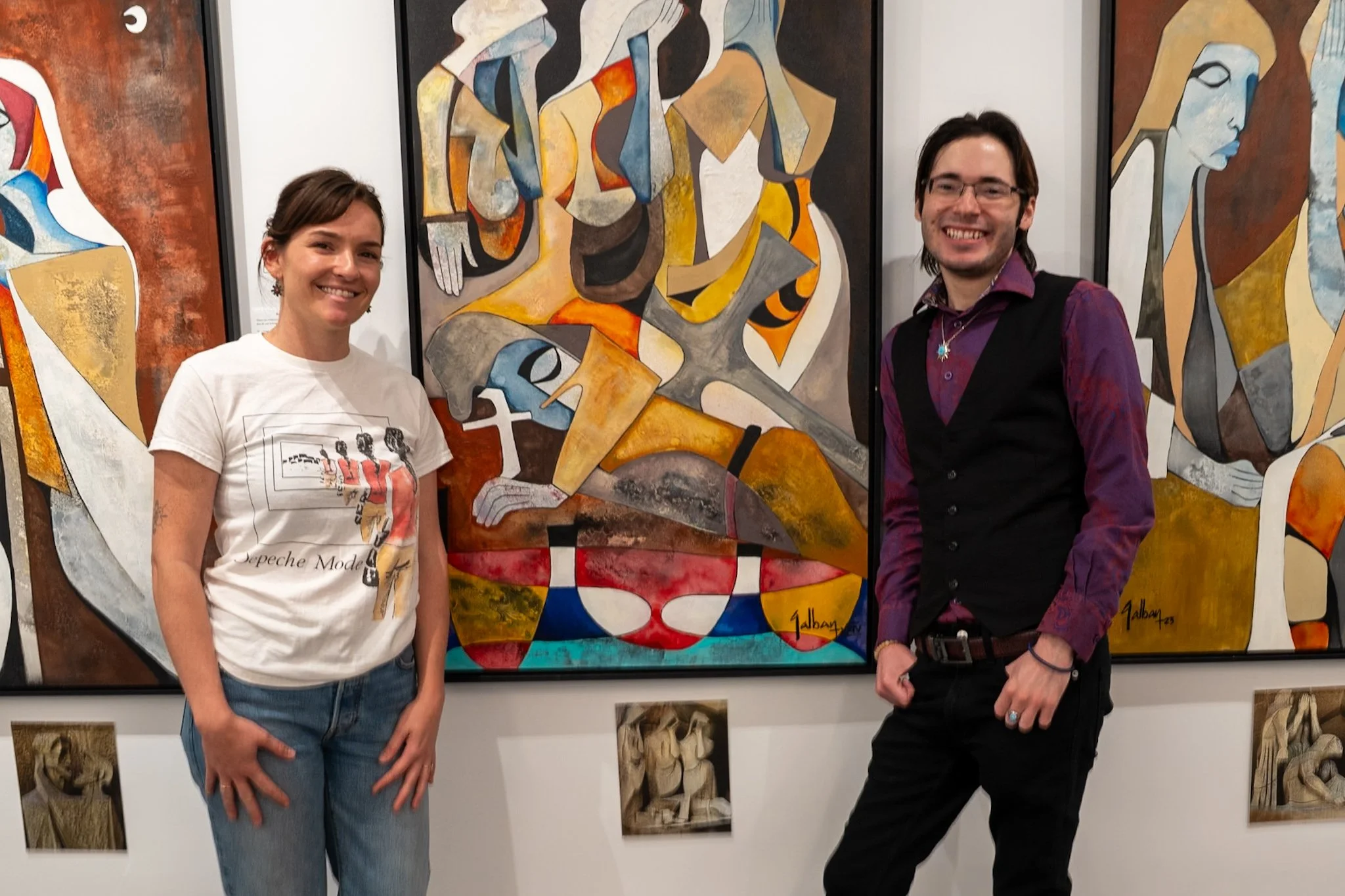 Molly and Antionio in front of paintings.JPG