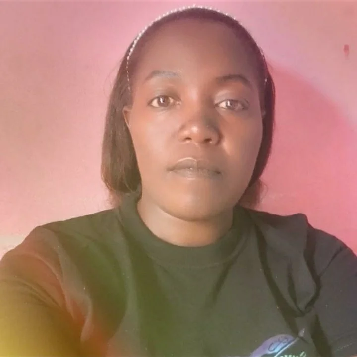 Ernestine Kom, Programs Coordinator