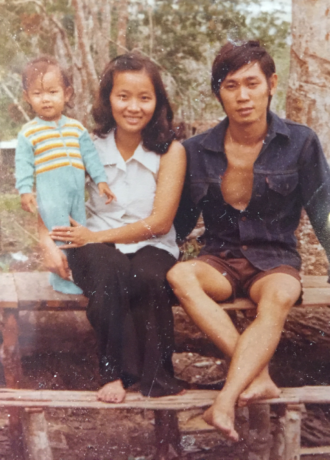 Mr. Mak, Mrs. Mak, and their daughter Frances in a refugee camp in Laos in the 1970s.