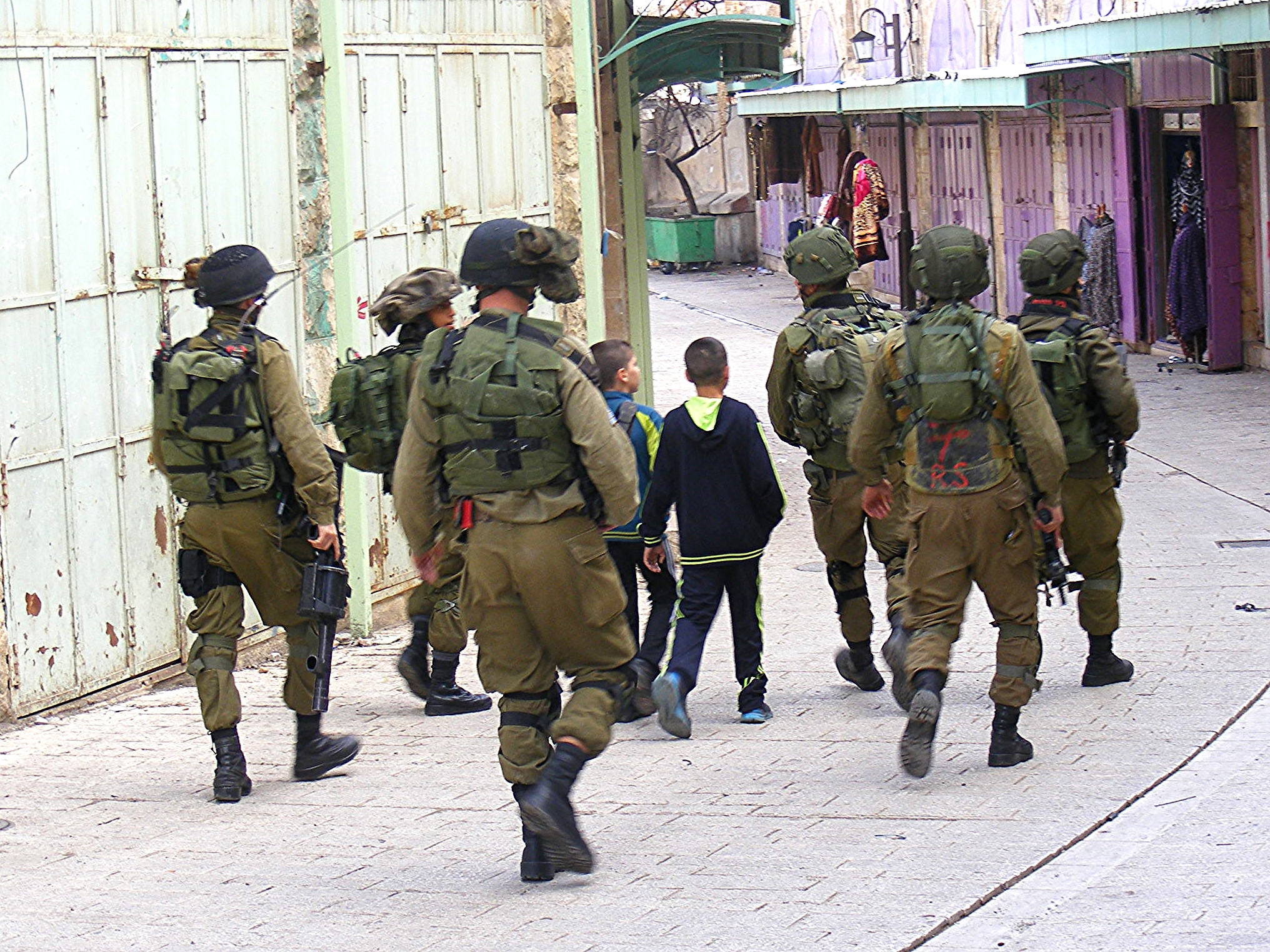 A 10- and 11-year-ols are arrested for allegedly throwing stones. Under Israeli Military law, no one under 12-years-old may be arrested. 