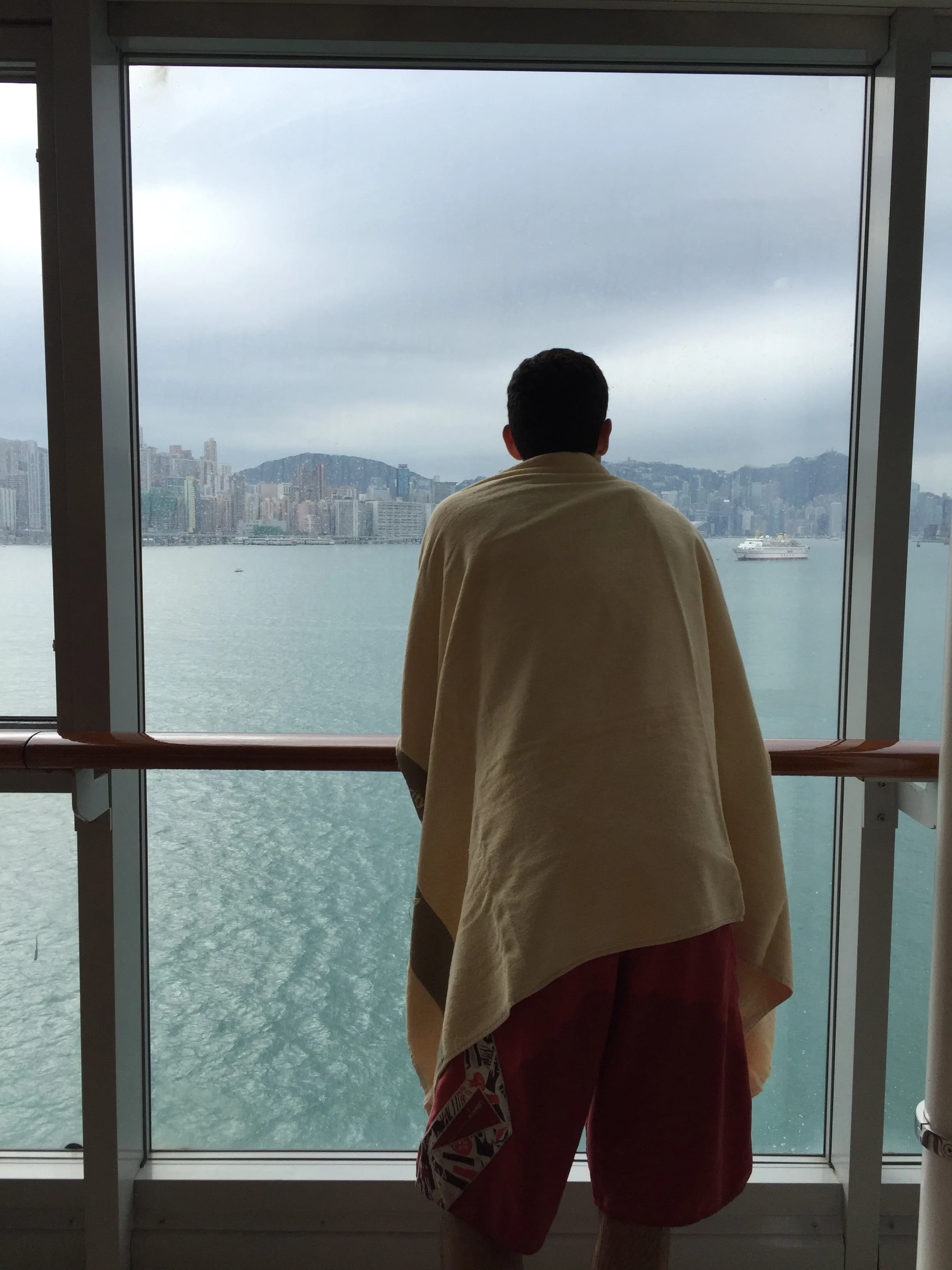  Derek, pondering life, while staring out into the HK bay from the ship.&nbsp; 