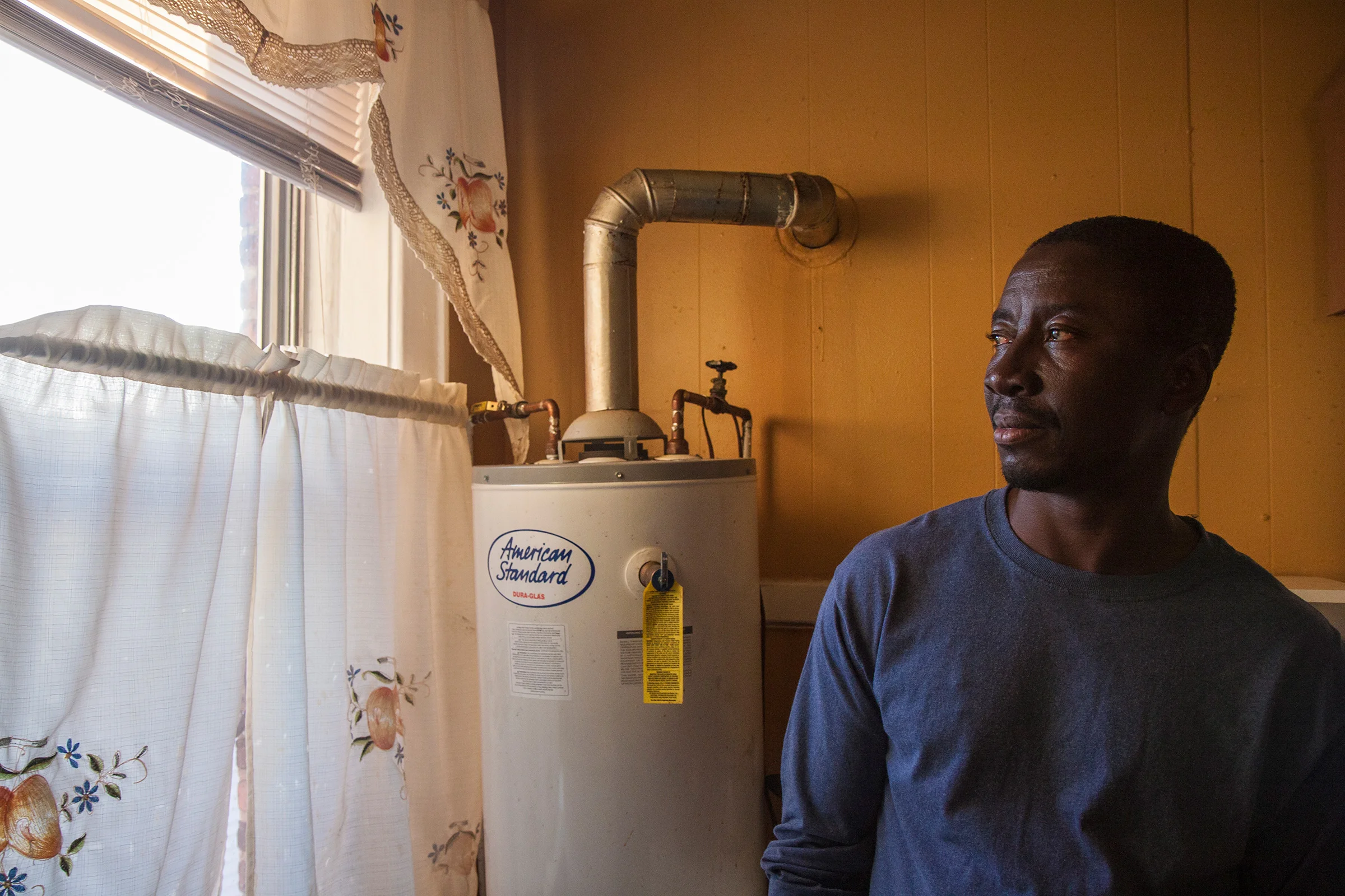 Obi* is from Nigeria. Boko Haram murdered his father and close friend, and he was forced to flee. He traveled by ship from Cameroon to Panama then followed smugglers through Central America until reaching the U.S.-Mexico border. Robbed and badly beaten along the way, he received medical attention at the border, and was then sent to an immigrant detention facility in Elizabeth, New Jersey. He was in detention for nearly a year before being granted asylum. He now shares an apartment in Newark, New Jersey with two other formerly detained asylees.