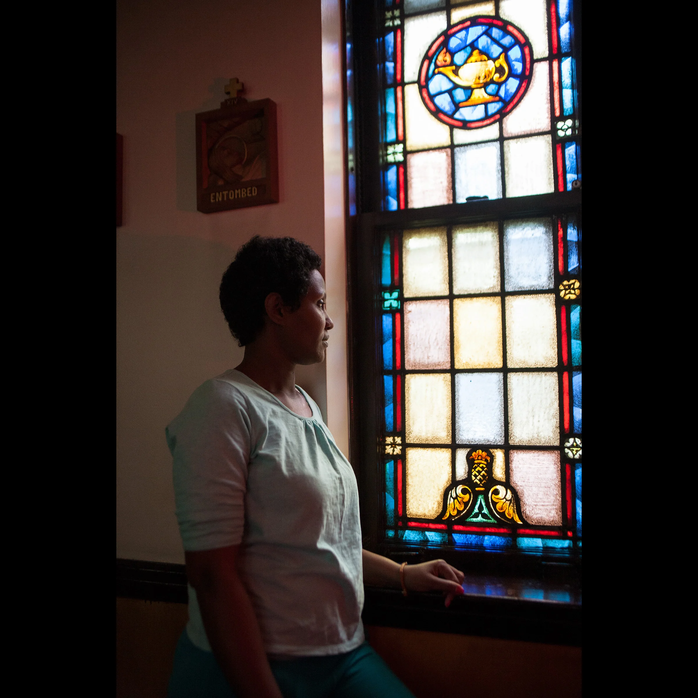 Samri is from Eritrea in East Africa. She speaks the native language Tigrinya. Facing religious persecution, she fled her country in early 2015. Her journey to America was long and extremely perilous. Her family and church helped her purchase a ticket, and she flew to Brazil, where smugglers led her across the country. She walked four days in a small group to cross the Amazon River, which has currents so strong that many die in the process. She then traveled through Peru and north, to Central America, until finally reaching the Mexican border. Much of the journey was on foot, and she faced risks traveling alone as a young female. She was apprehended at the US-Mexico border, and was sent to an immigrant detention facility in California, and then transferred to a facility in New Jersey where she remained 4 months until granted asylum. She is now living temporarily with nuns at a convent in New Jersey.