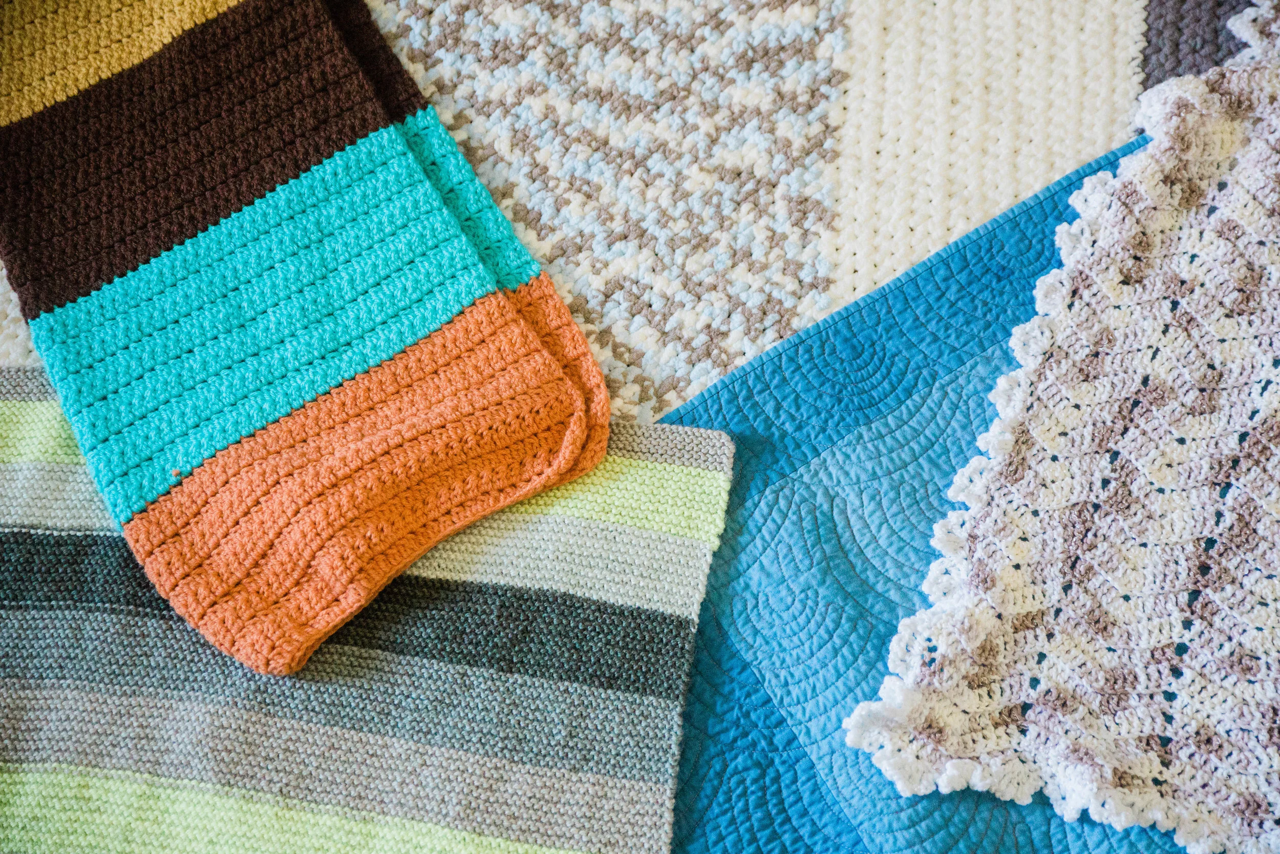 So loving all these handmade baby blankets! Going clockwise from the top, they are made by: my mom, Juliana Jones, Charley Machicote, my sister, and Destiny Brinkman. 