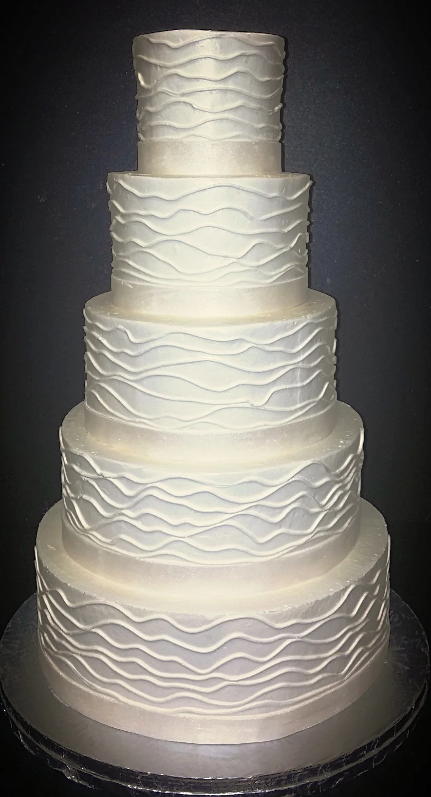 FIVE TIER WHITE WAVEY LINE CAKE 1010140930.jpg