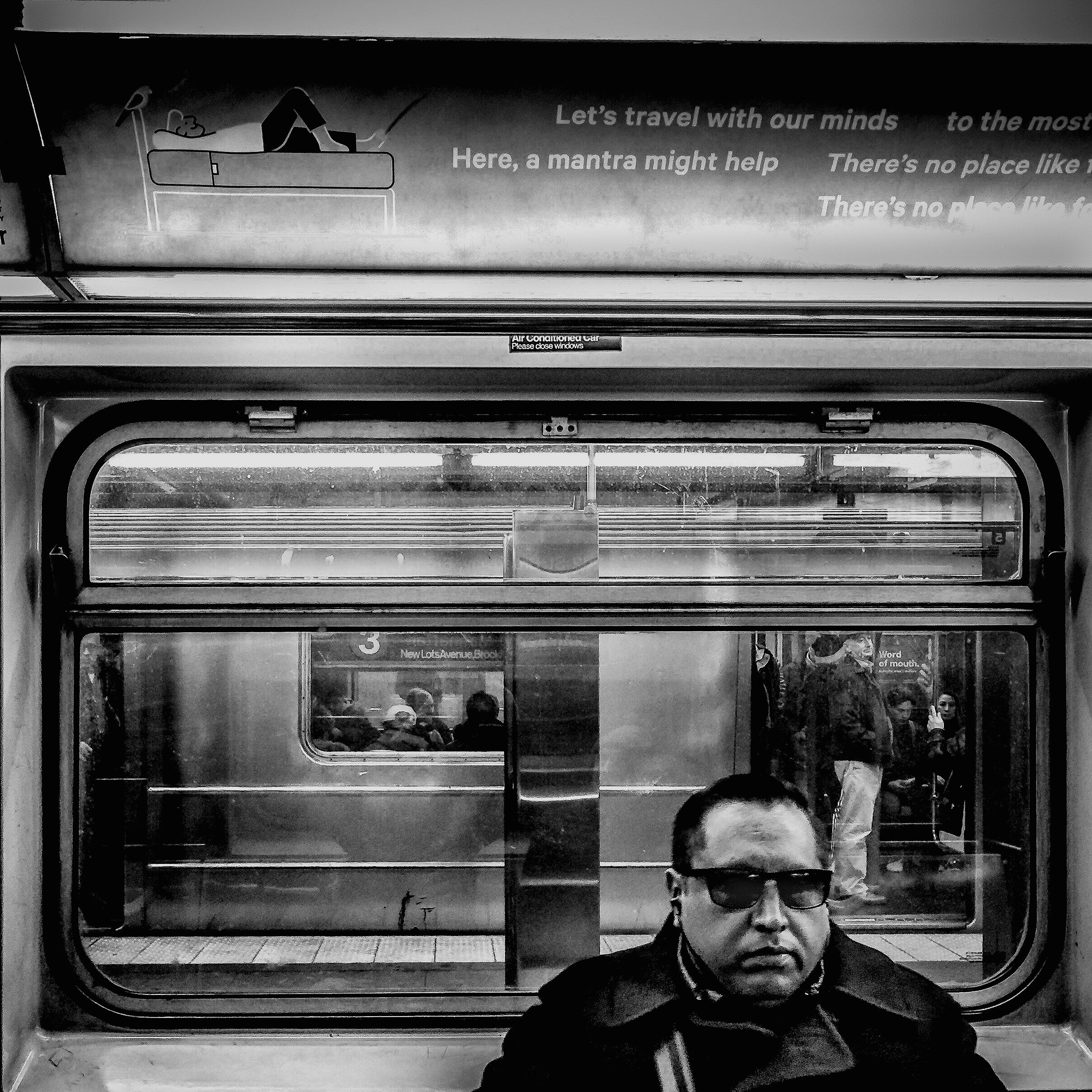 NYC_Moment+%2318+b%26w_SQ_man+on+NYC+subway-5705-4.jpg