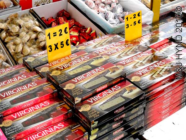 santapola market turron: spain santa Pola Saturday market flavoured turron nougat, individually wrapped sweets
