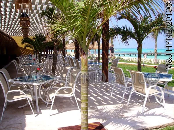 cancun, mexico : Dreams Resort & Spa Cancun Yucatan Peninsula Gulf of Mexico tropical, crystal-clear Caribbean, restaurant, palm trees, beachfront jetty, palapa umbrella