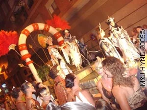 float with archway: spain Santa Pola Palmeral Park Moors Christians fiesta, festival procession, dazzling colour, Moorish King and Queens, religious floats with archway, spectators galore