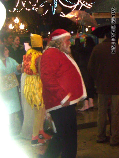 santa: spain Alicante Carnival Fiesta, Costa Blanca, Santa Claus costume, chicken costume, festive cheer