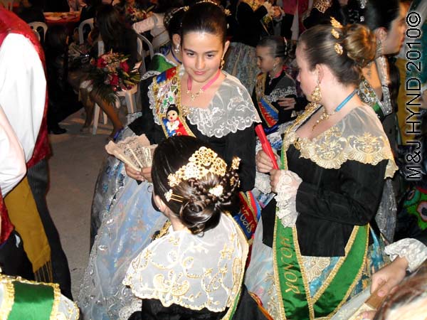 3 girlies: spain perleta maitino St Vicente de Ferrer Fiesta, ladies-in-waiting, traditional long gowns, winner's sashes, ladies traditional coiffed high-combed hairdo, lace mantilla, peineta